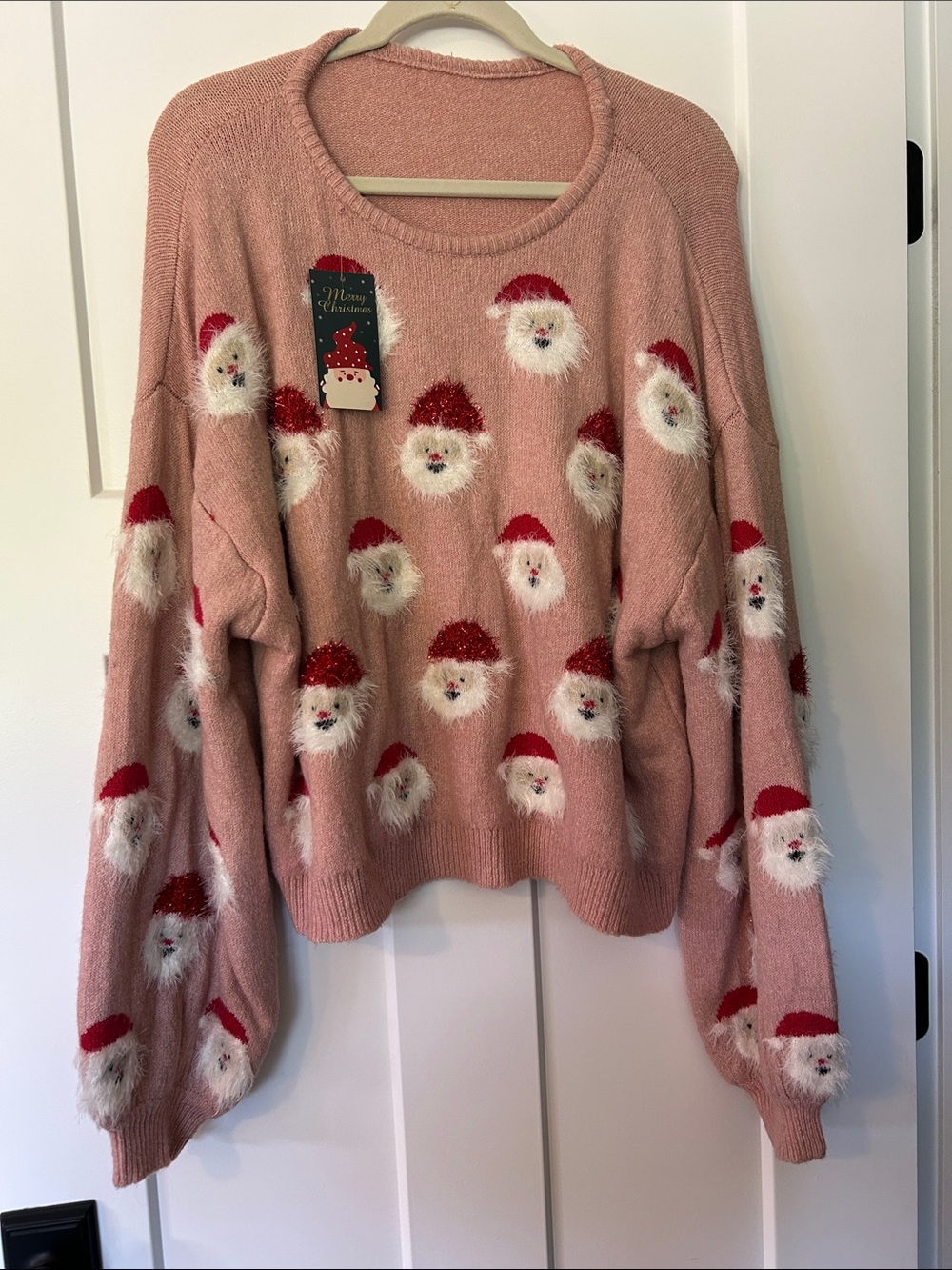 LeSmart women’s pink oversized sweater Santa faces front and sleeves size xxx